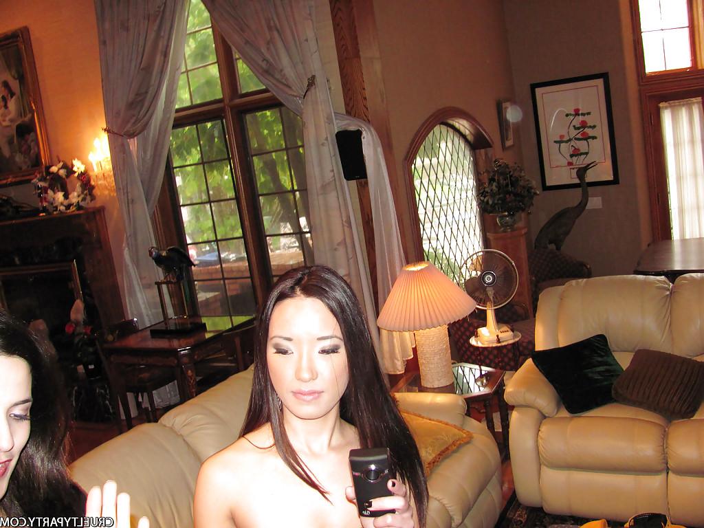 16P Busty babe Capri Cavali gives a blowjob and a titjob at a hot party