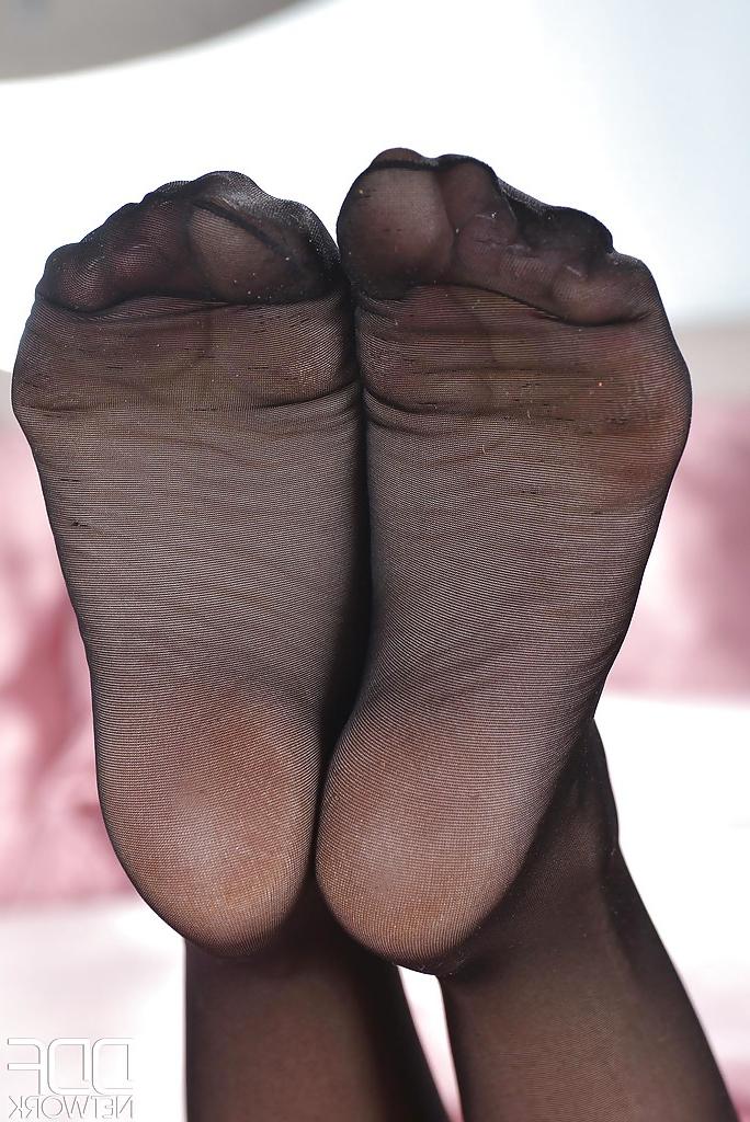 16P Brookie G. is teasing her hot legs in her sweet black pantyhose