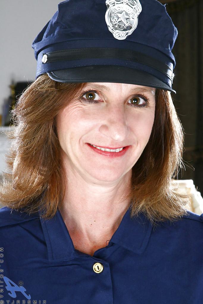 16P Luscious mature in lady cop uniform brings out nice boobies and tight ass