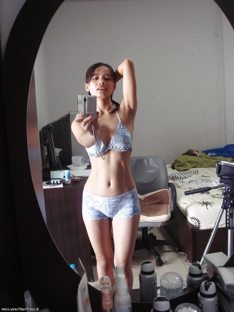 16P Playful Asian babe Lana Selfshot demonstrating trimmed pussy and fingering