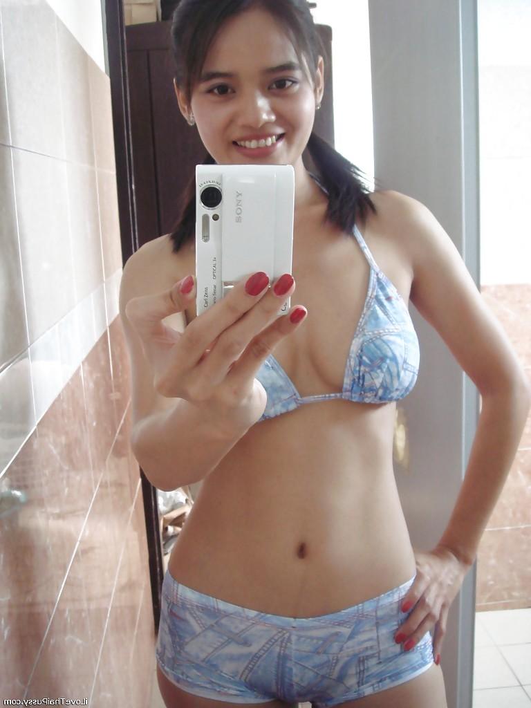 16P Playful Asian babe Lana Selfshot demonstrating trimmed pussy and fingering