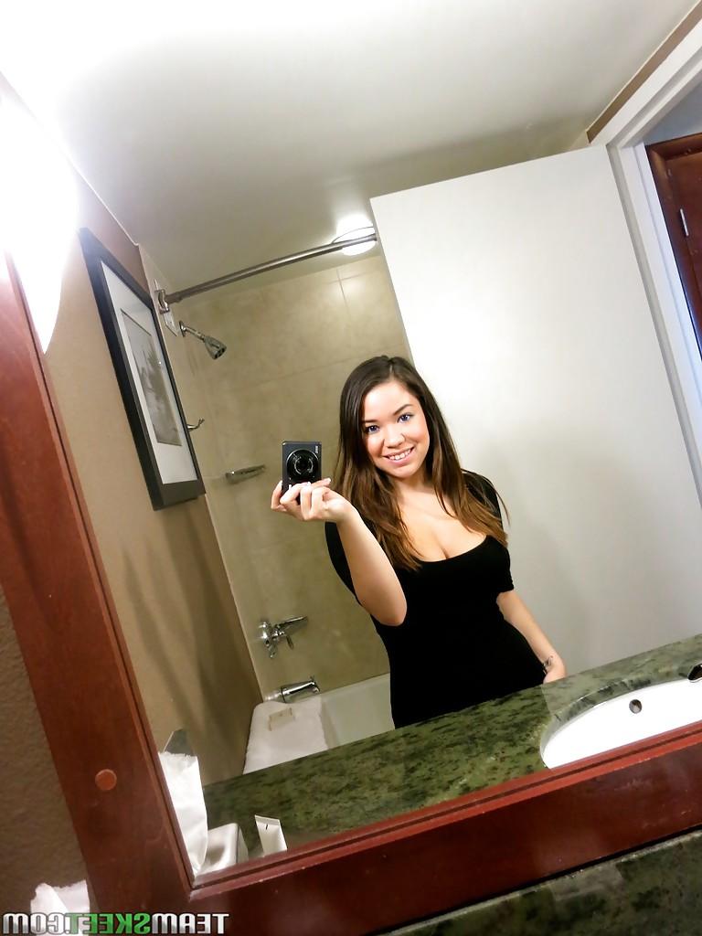 13P Busty amateur Audrina Grace making a selfie and getting naked