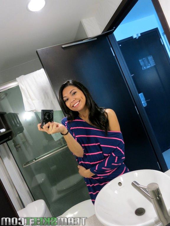 16P Smiley amateur sweetie making selfies and revealing her shaved cooter
