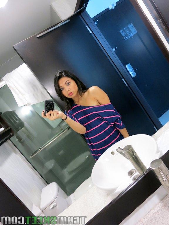 16P Smiley amateur sweetie making selfies and revealing her shaved cooter