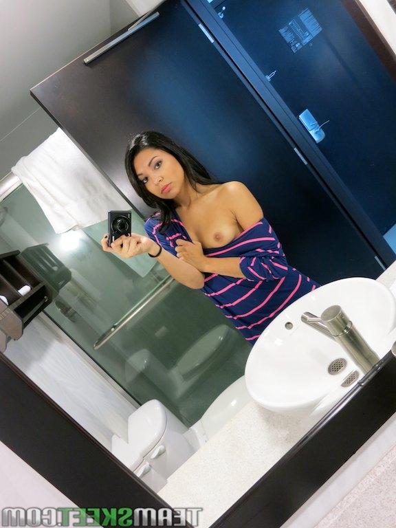 16P Smiley amateur sweetie making selfies and revealing her shaved cooter