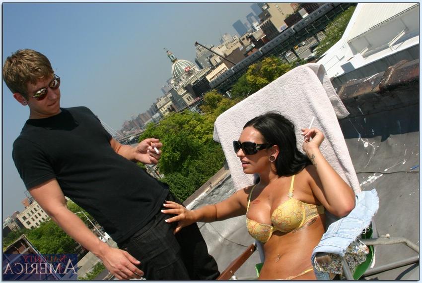 16P Lusty teen Kitty Bella gets a thick dick to suck on the roof