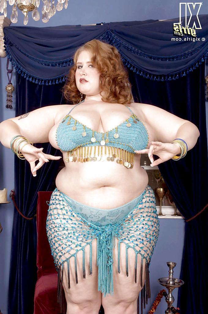 16P Miss Isabelle performs a belly dance and makes her fat tits and ass bounce