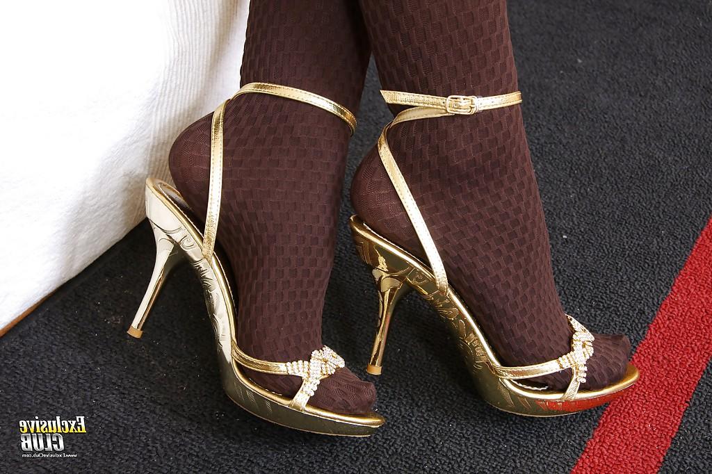 16P Slut in stockings and high heels Rihanna Samuel is spreading her peach