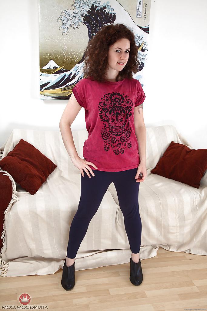 16P Mature chick Candy takes off her yoga pants and reveals her horny hairy pussy