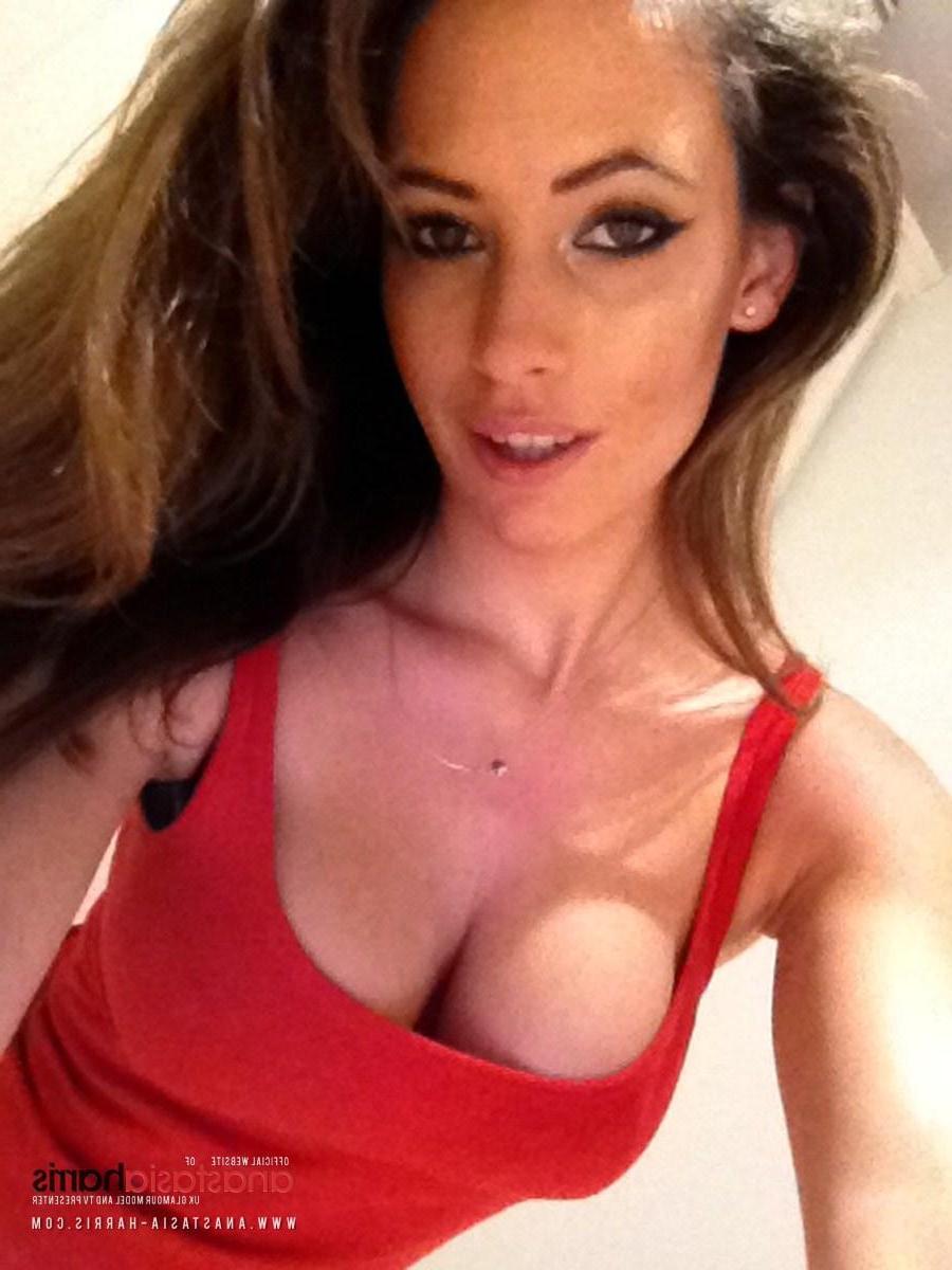 12P Anastasia Harris peels off her red dress and plays with her stockings
