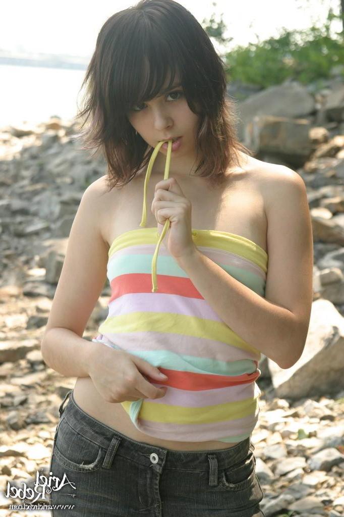 15P Ariel Rebel topless on the beach