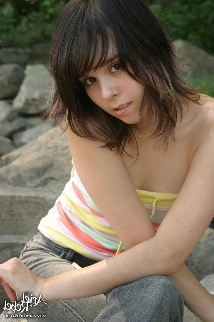 15P Ariel Rebel topless on the beach