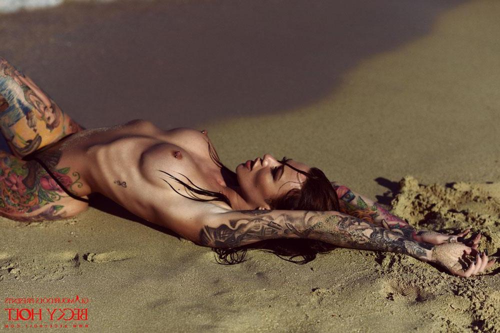 12P Becky Holt in her bikini getting wet on the beach