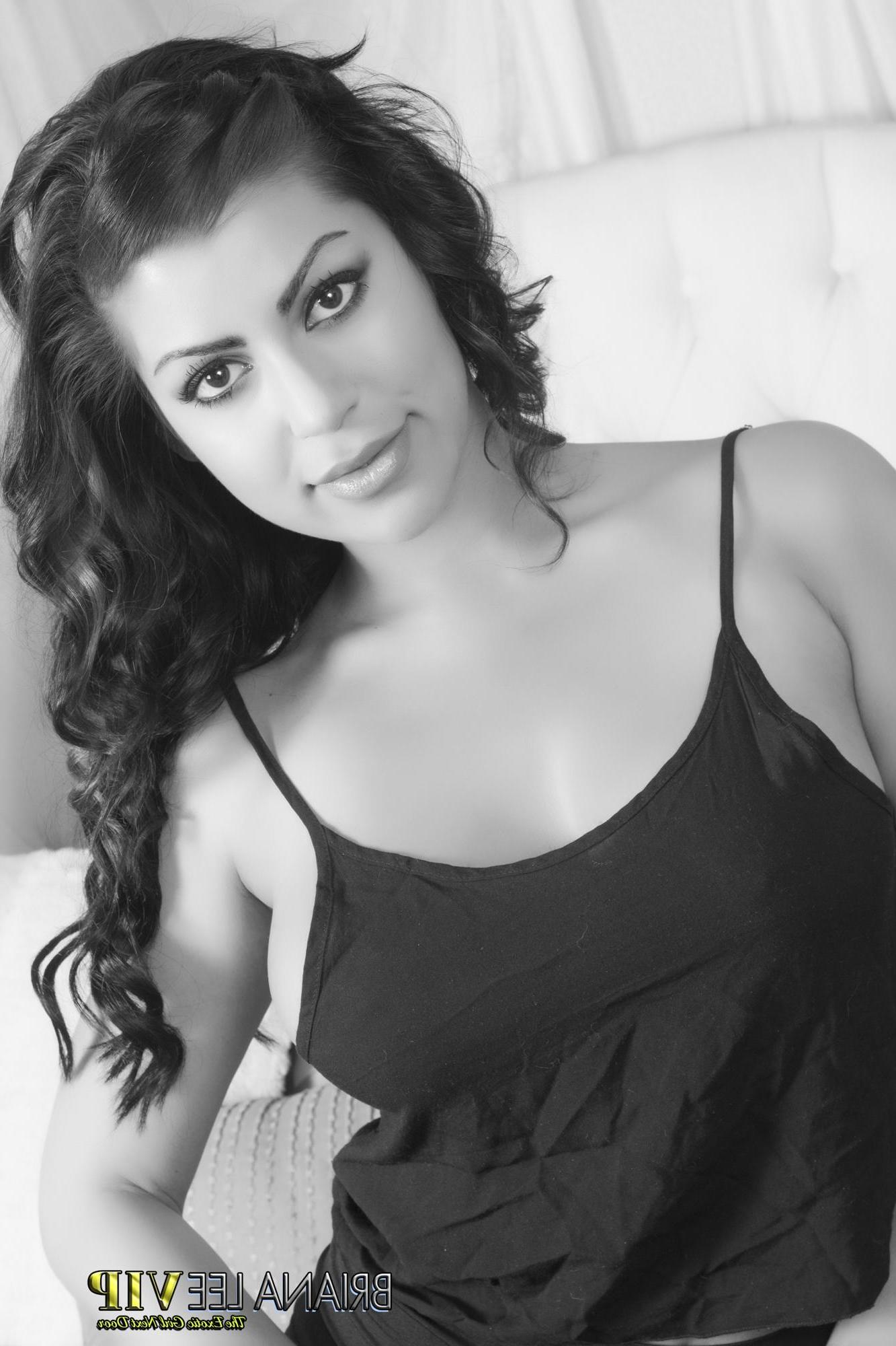 15P Busty hottie Briana Lee poses in black and white