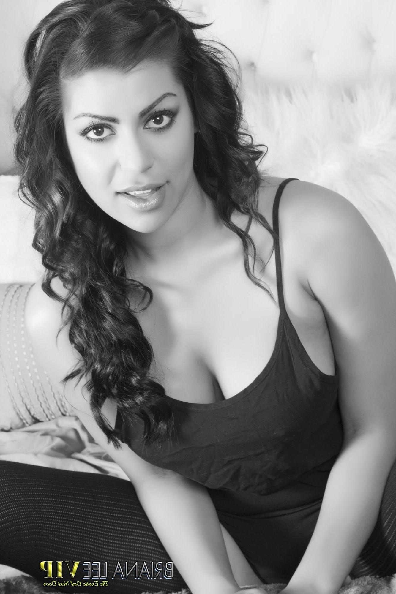 15P Busty hottie Briana Lee poses in black and white