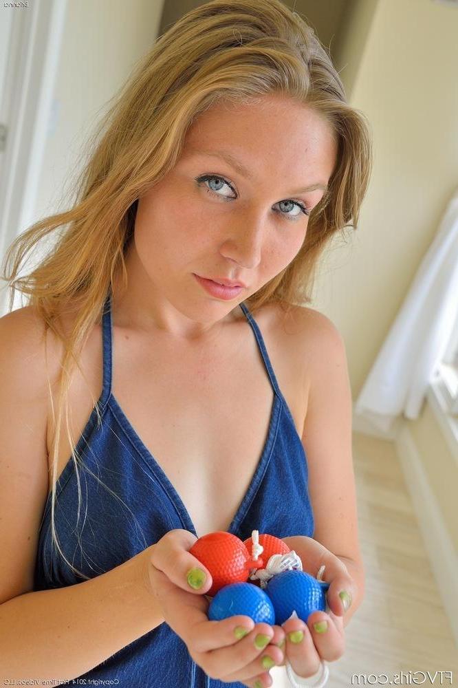 15P Beautiful blonde girl Brianna lifts her dress to pleasure her tight pussy