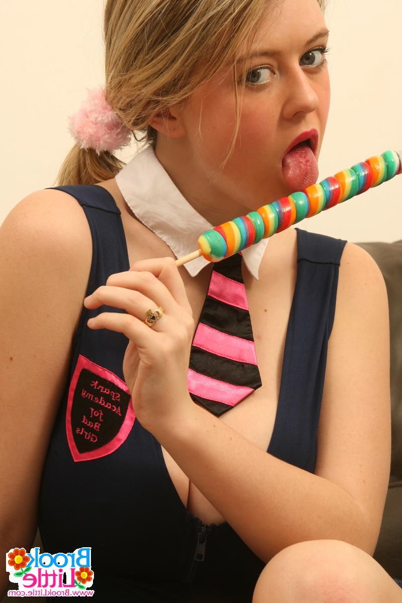 20P Pictures of teen hottie Brook Little putting something long and hard in her mout
