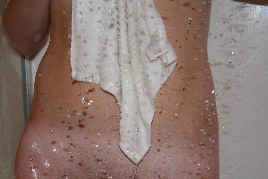 14P Pictures of teen amateur Busty Barbi getting all wet for you