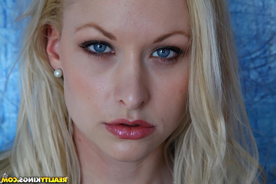 16P Seriously hot blond babe posing sexy see-thru leotard