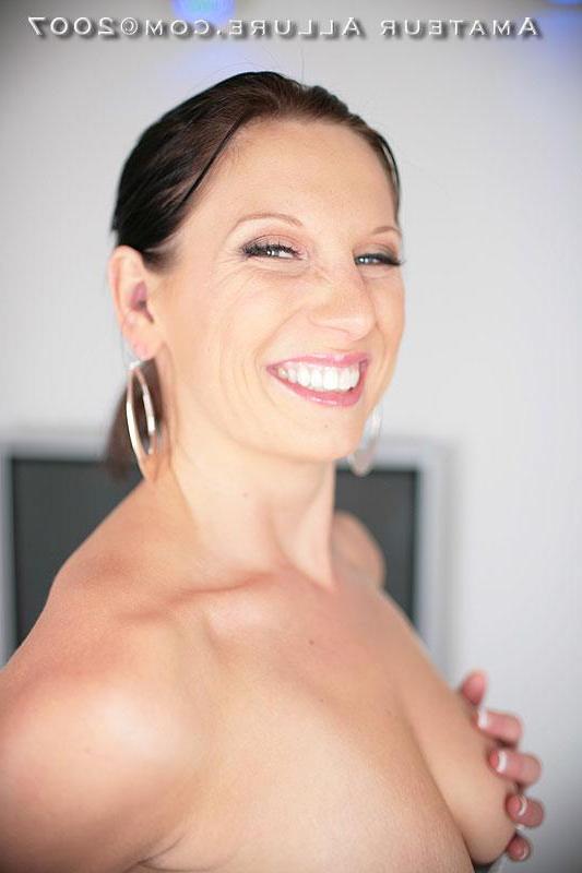 16P Pictures of busty brunette girl Candace sucking on a hard cock