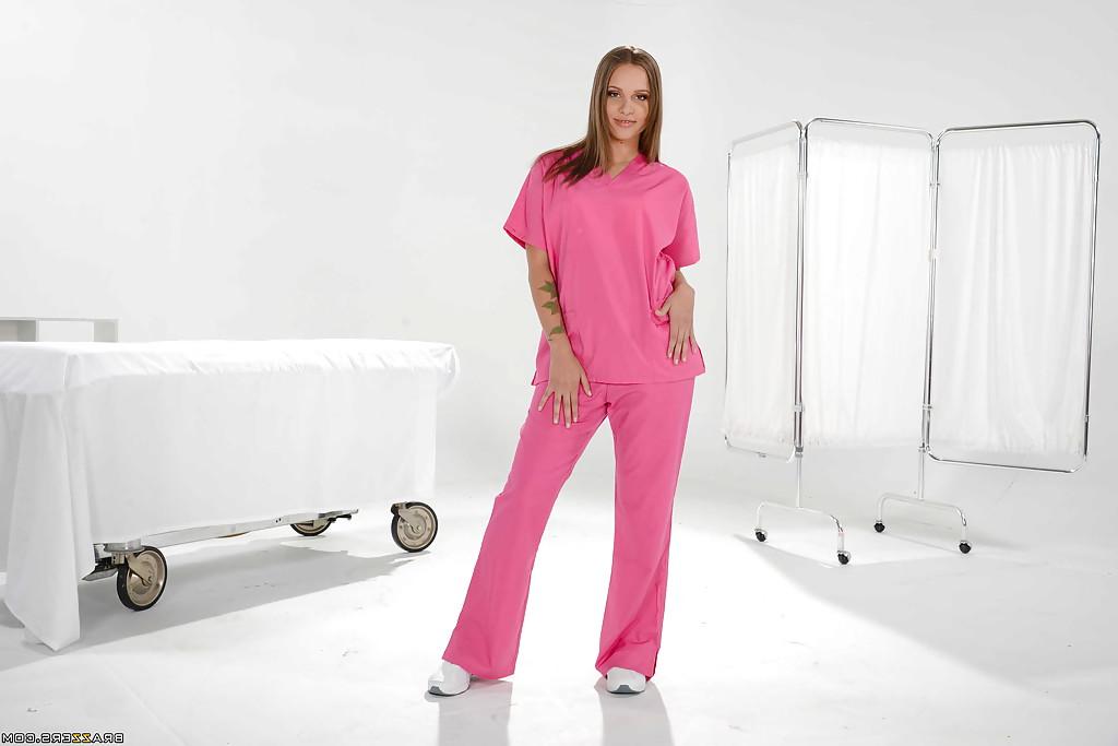 16P Teen solo girl Liza Rowe removes nurse uniform to expose small tits and ass