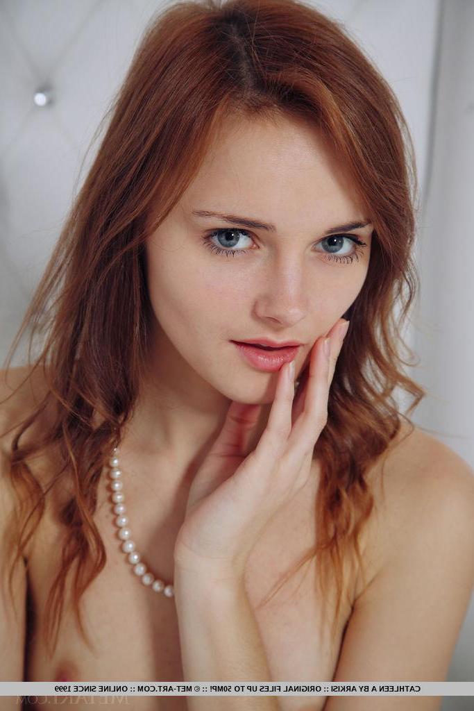 18P Redhead girl Cathleen A shows off her pink and moist assets