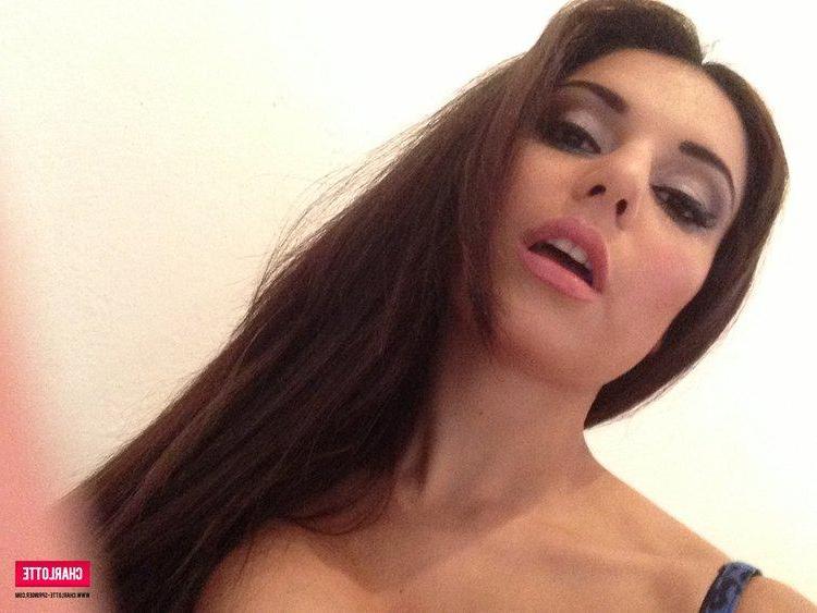 12P Charlotte strips from her tight top on the stairs