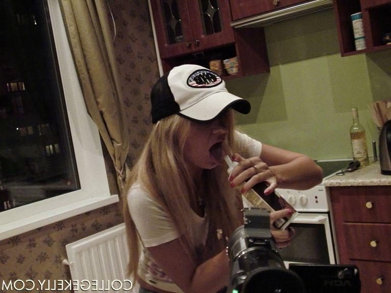 17P Pictures of College Kelly getting naughty in the kitchen