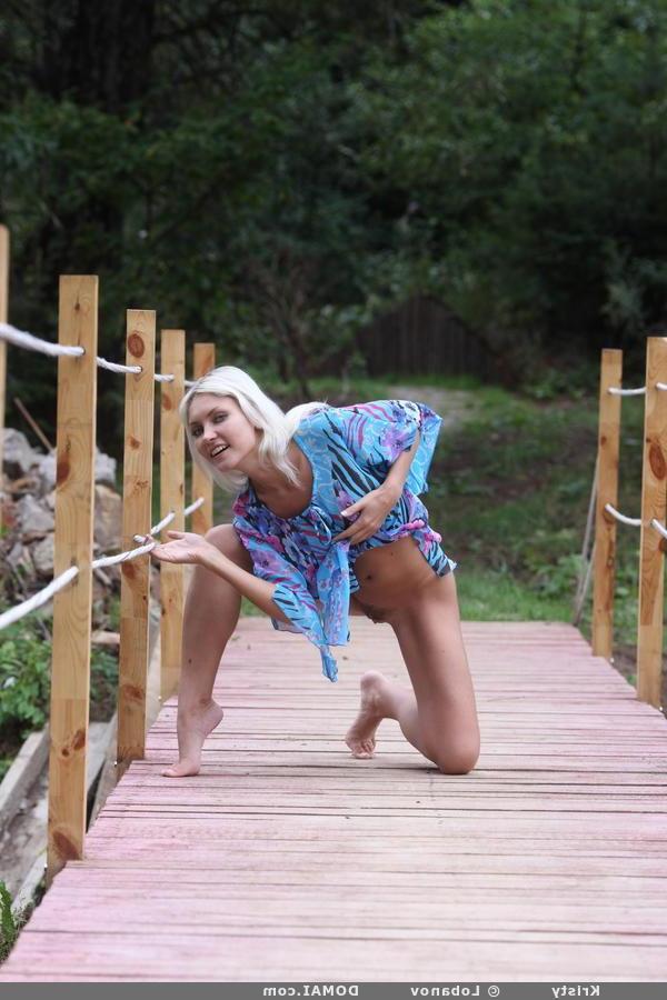 16P Blonde beauty Kristy exposes her legs and pussy on the dock