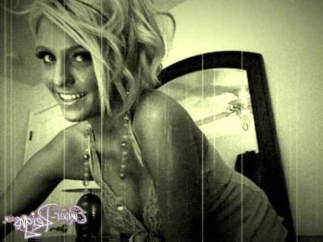 15P Pictures of Ember Reigns naked in an old style photo