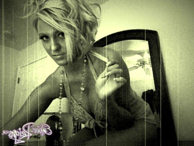 15P Pictures of Ember Reigns naked in an old style photo