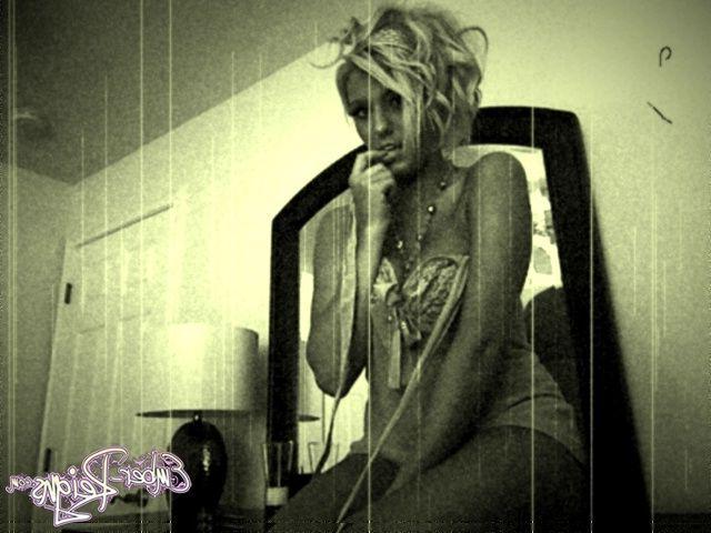 15P Pictures of Ember Reigns naked in an old style photo