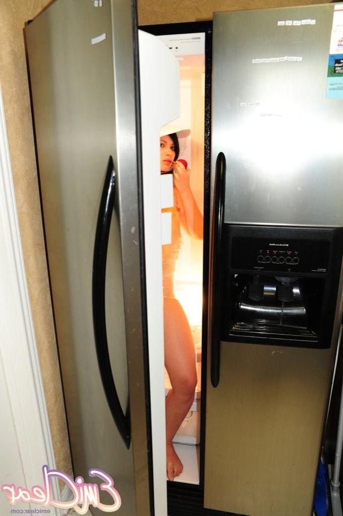 20P Pictures of teen chick Emi Clear chilling out in a fridge