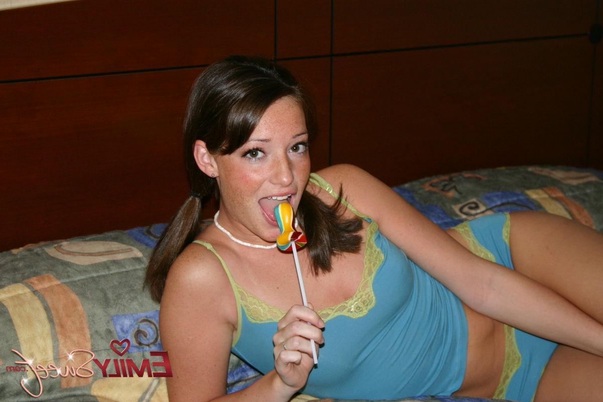 18P Pictures of teen nympho Emily Sweet putting something long and hard in her mouth