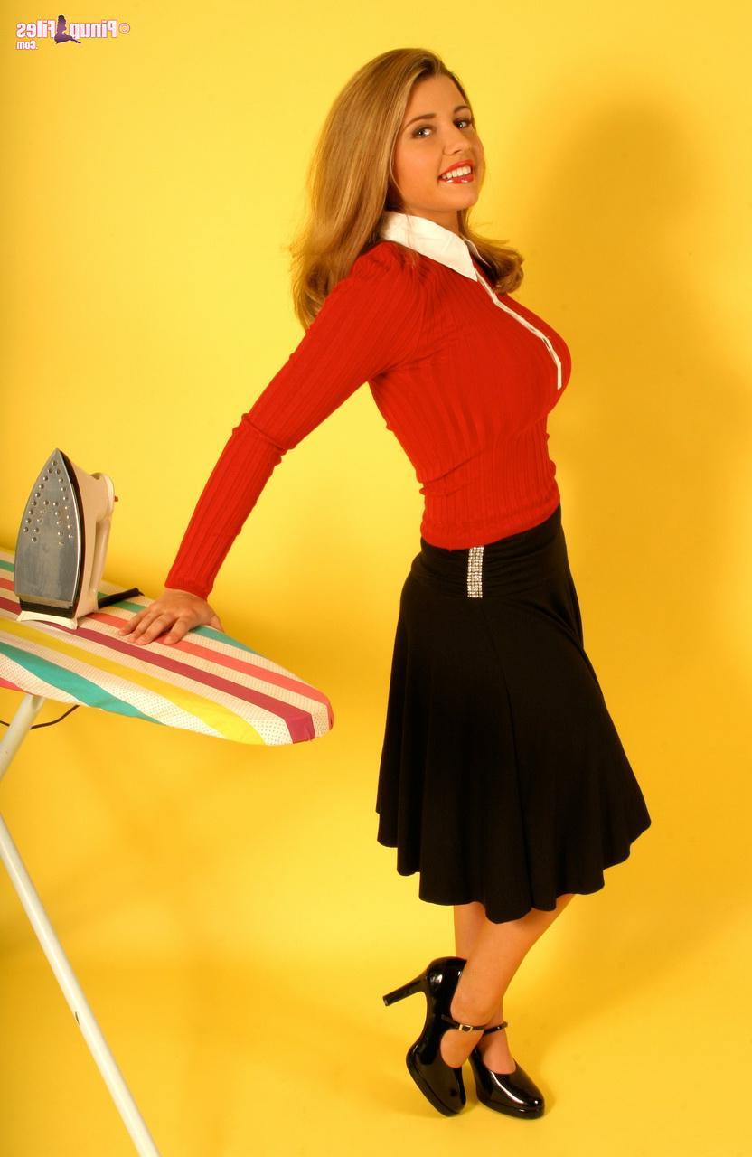 15P Busty blonde pinup Erica Campbell is your sexy retro housewife