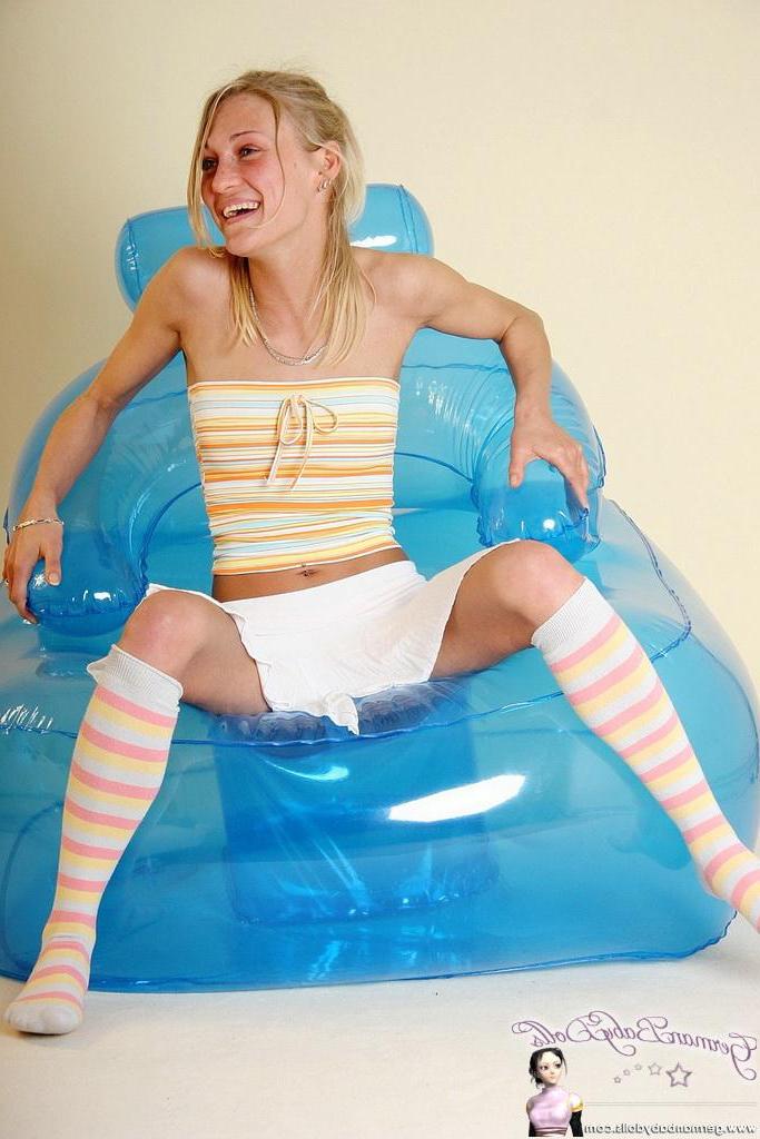 15P Pictures of GBD Jean teasing in a sexy posing on a blue armchair