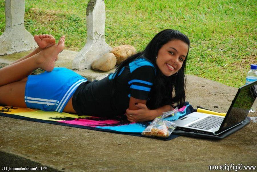 15P Pictures of Gigi Spice toying her tight pussy