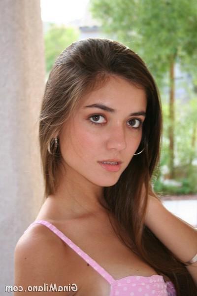 18P Pictures of Gina Milano teasing in a corset and jeans