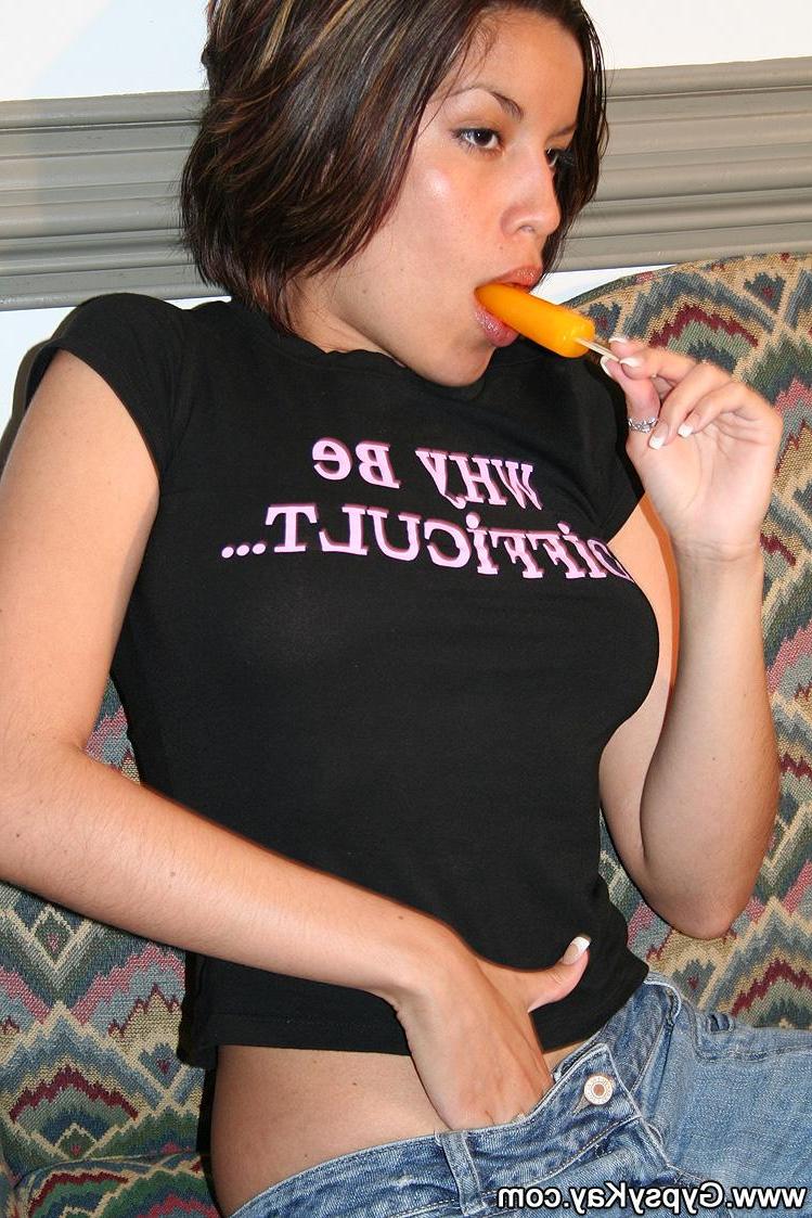 16P Pictures of teen Gypsy Kay putting something hard in her mouth