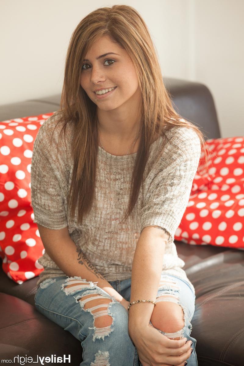 15P Hailey Leigh slides down her ripped blue jeans and shows you her tight pussy