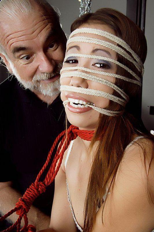 20P Pictures of Isis Lee tied up and molested by an old guy