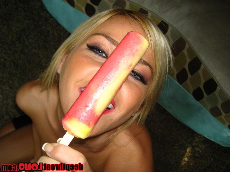 16P Pretty blonde girl McKenzie Miles perfecting oral sex technique with food
