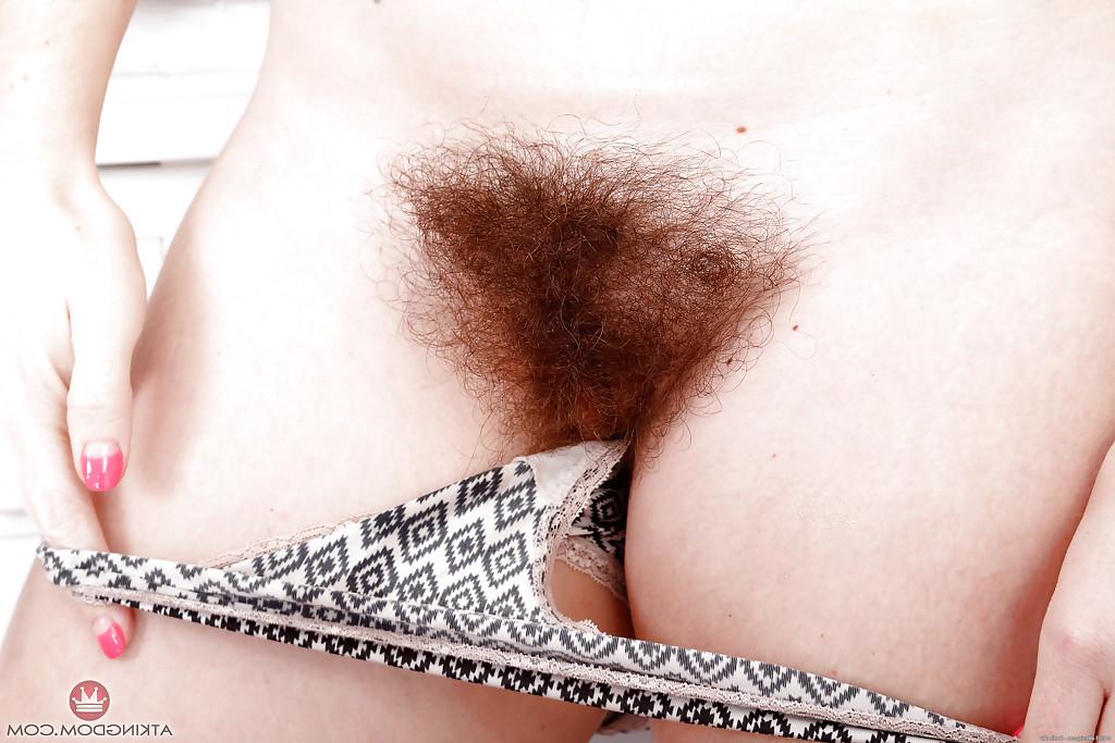16P All natural solo model Simone Delilah displaying hairy body parts in kitchen