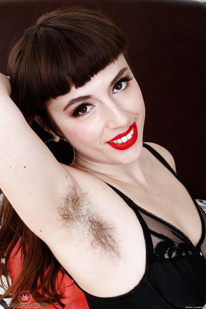 16P Hairy solo model Simone Delilah releasing fur covered legs from nylons