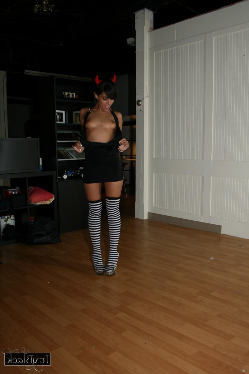 16P Brunette hottie Ivy Black puts on her devil horns and shows you her titties