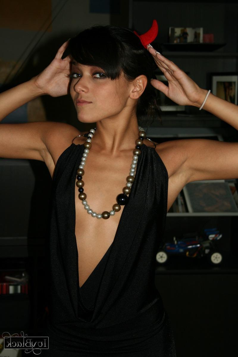 16P Brunette hottie Ivy Black puts on her devil horns and shows you her titties