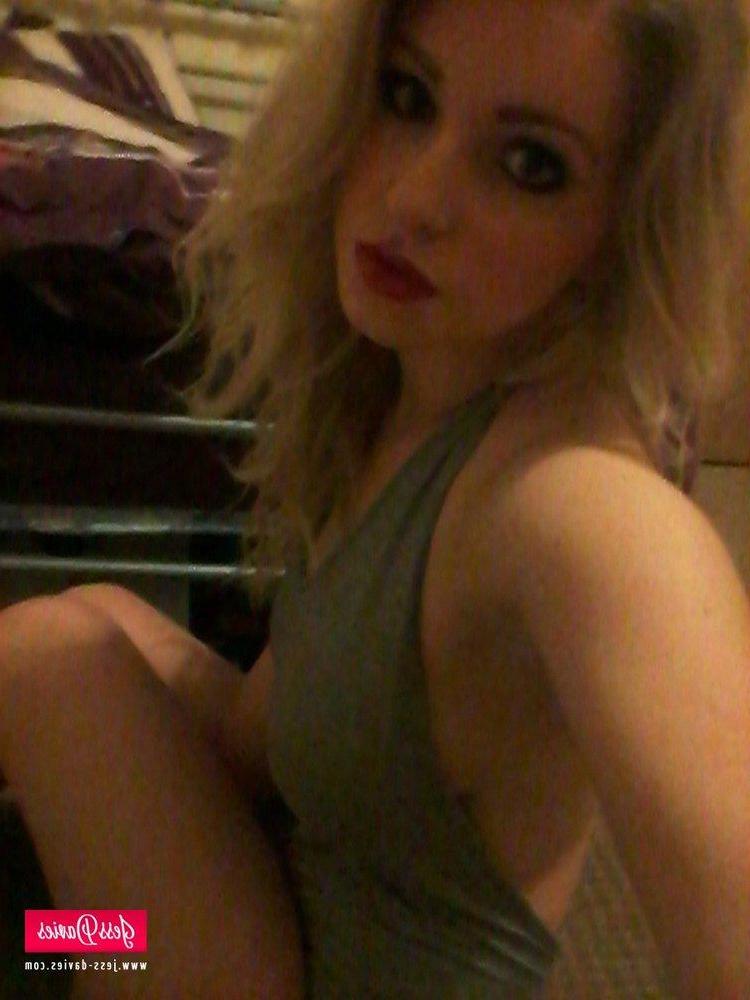 12P Jess Davies strips from her tight bodysuit