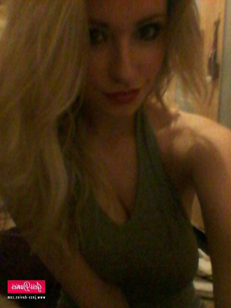 12P Jess Davies strips from her tight bodysuit