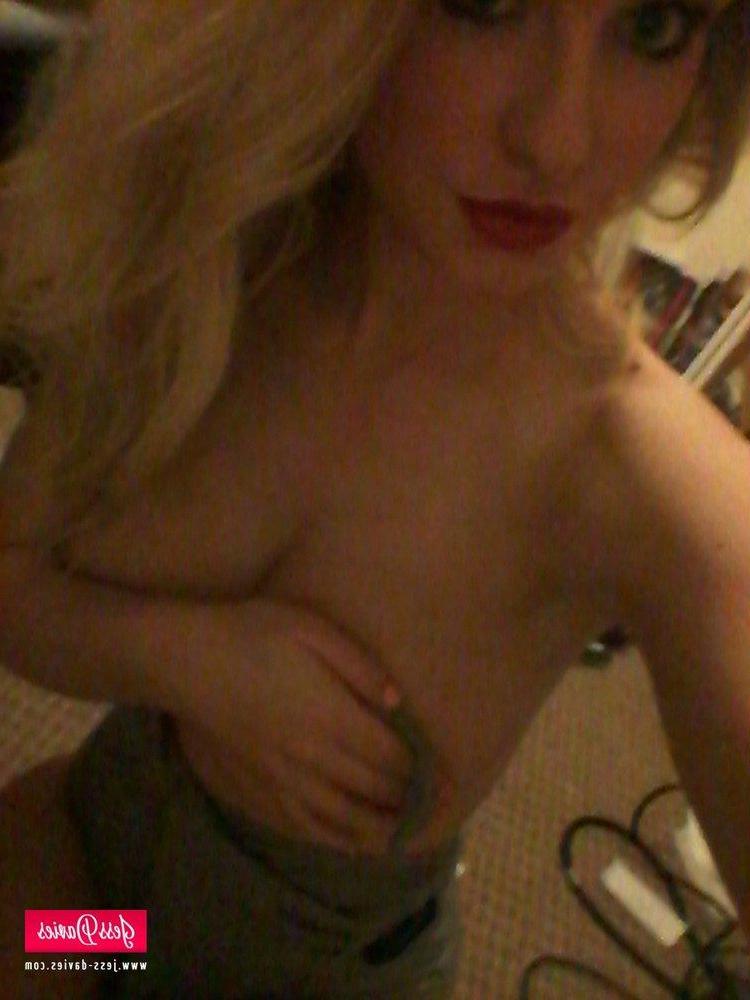 12P Jess Davies strips from her tight bodysuit