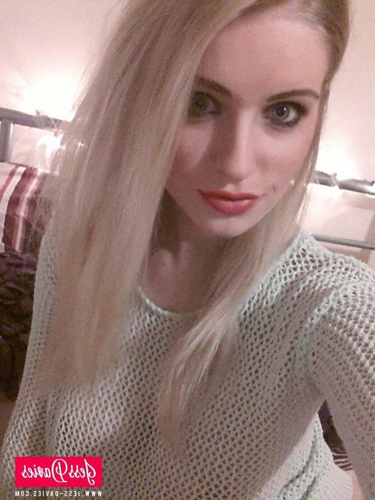 12P Jess Davies strips from her pullover to expose her nice round boobs